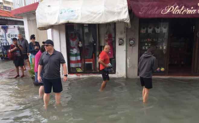 photo of flooding in downtown Cozumel in fall 2019 during rainy season