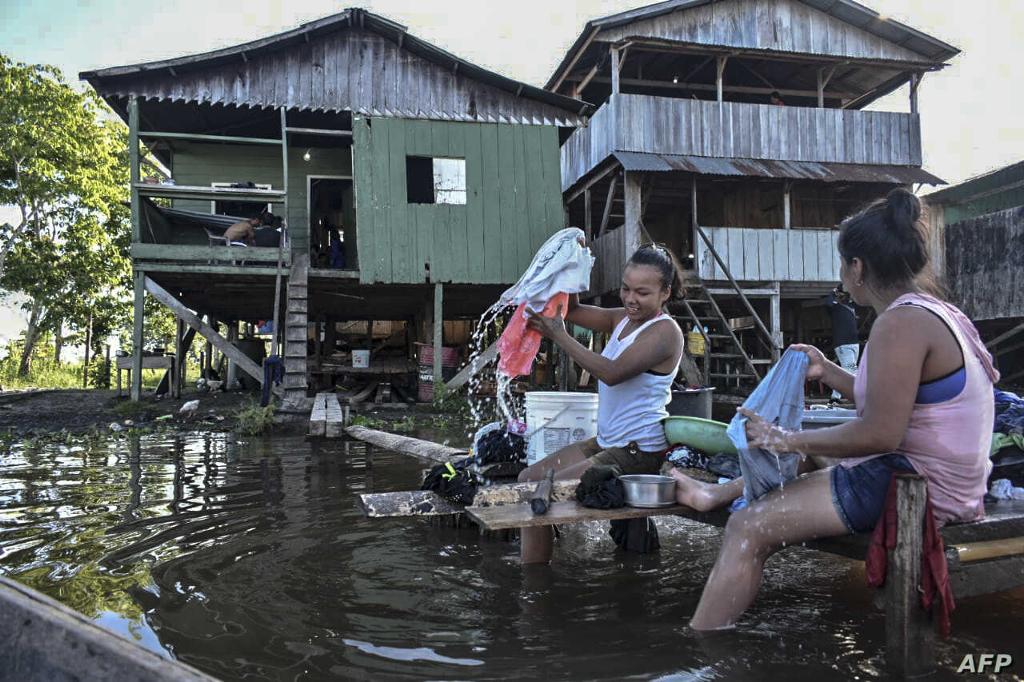 Women washing in Leticia, Colombia