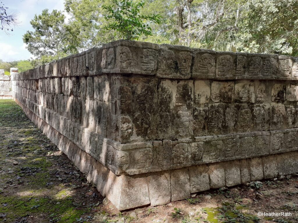 The Skull Platform with pictures of heads and skulls of Maya victims carved in stone.