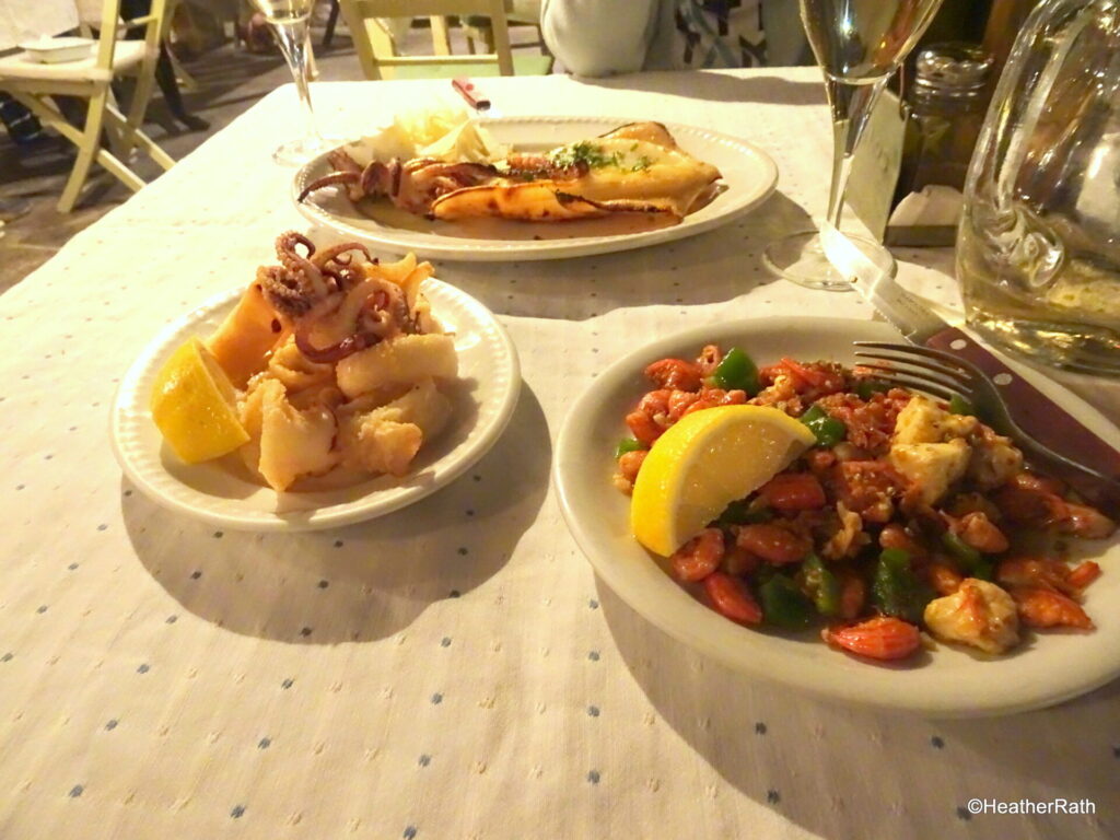 a plate of  local simiako garidaki - fried tiny shrimp - one eats the entire shimp, tails and all - no peeling!