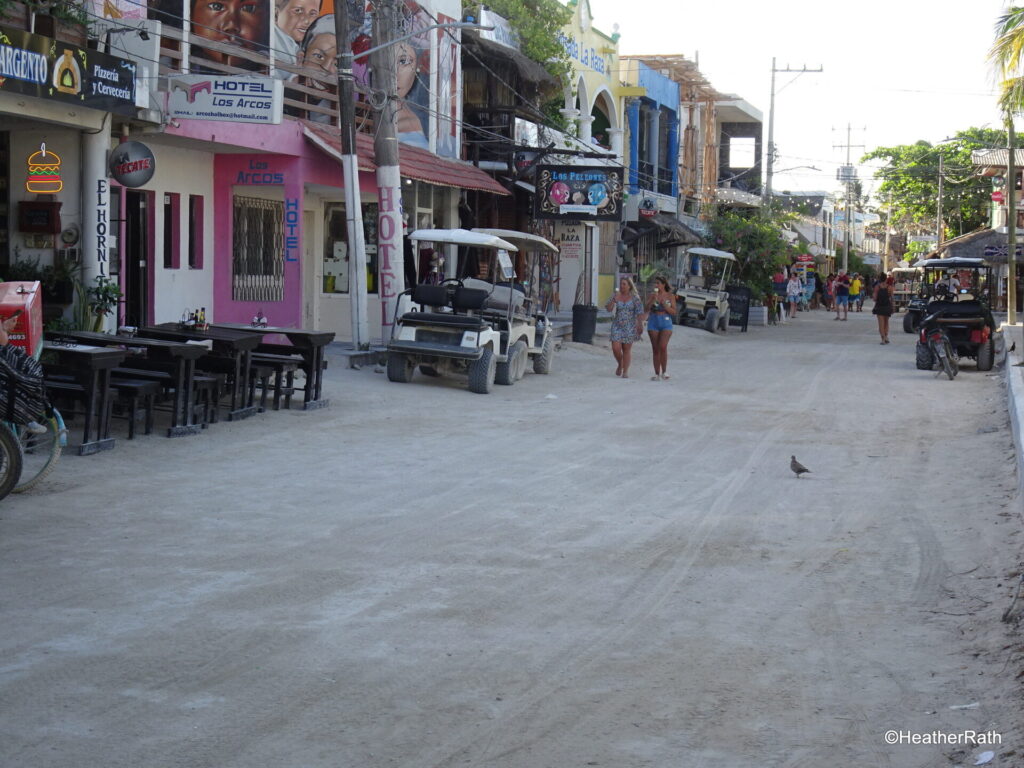 image of a scene on the main street of Holbox