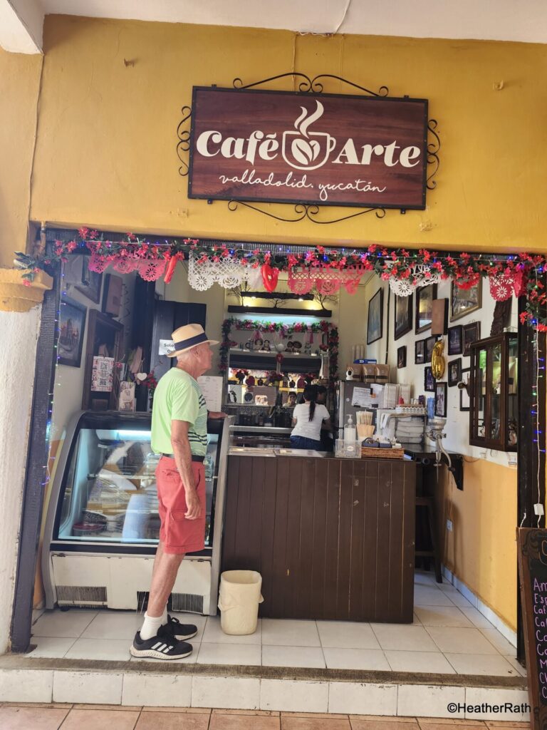 pic of Norm getting coffee at Cafe Arte