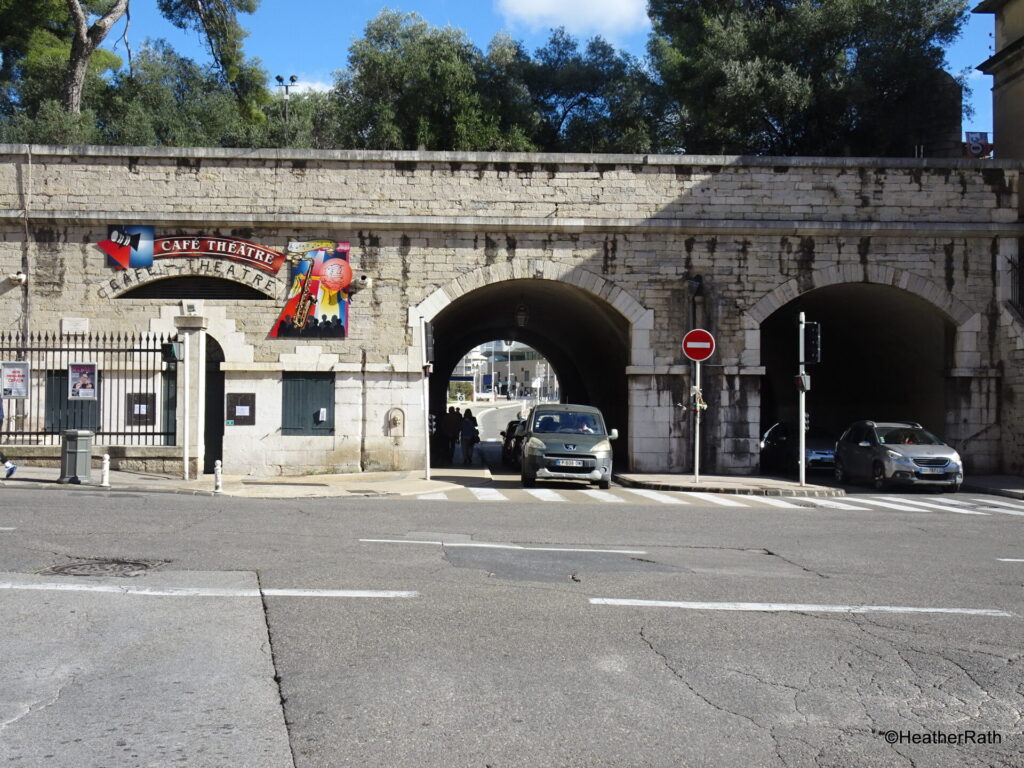 photo fo the gate (porte) d'Italie. shows part of the fortified old wall which protected the city