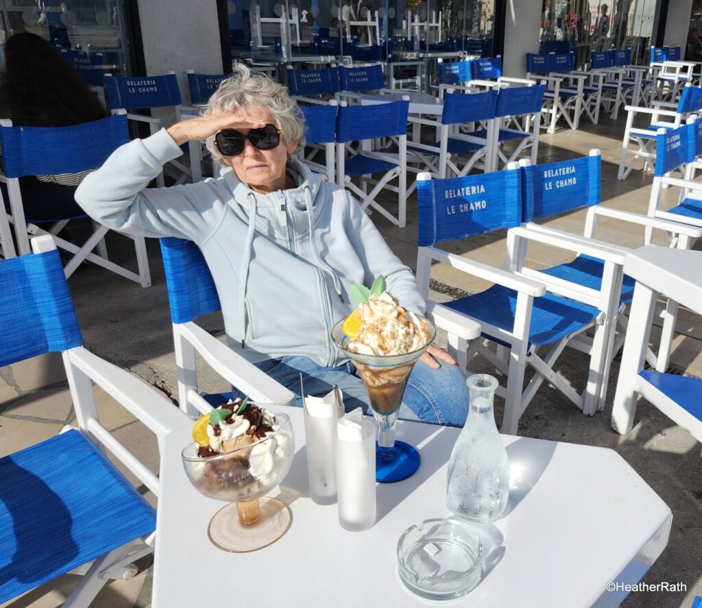 Photo of Heather with 2 alcoholic ice cream sundaes on the table