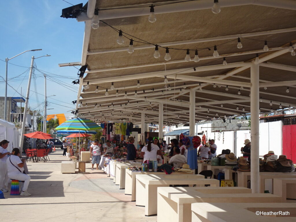 A block or two away is an outside market with clothes and crafts