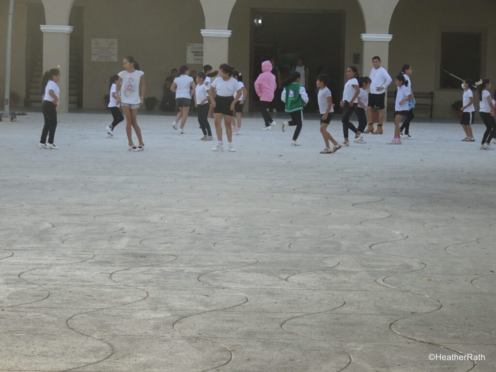 Kids engaged in a dancercise class in front of the Casa de la Cultura in which lies the tourist office of Progreso Yucatan