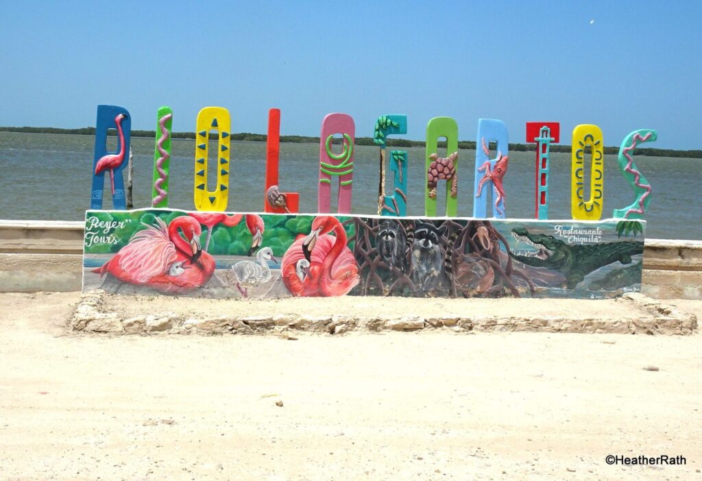 photo of the Rio Lagartos sign near the town's cenote.