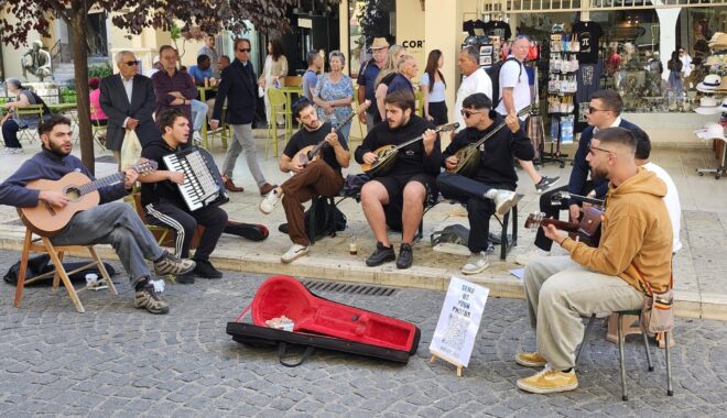 pic of a group of 8 Greek street musicians